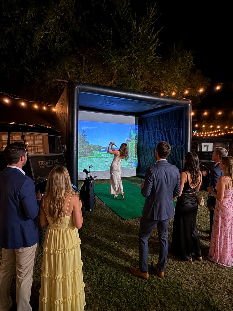 Elegant outdoor nighttime golf simulator party